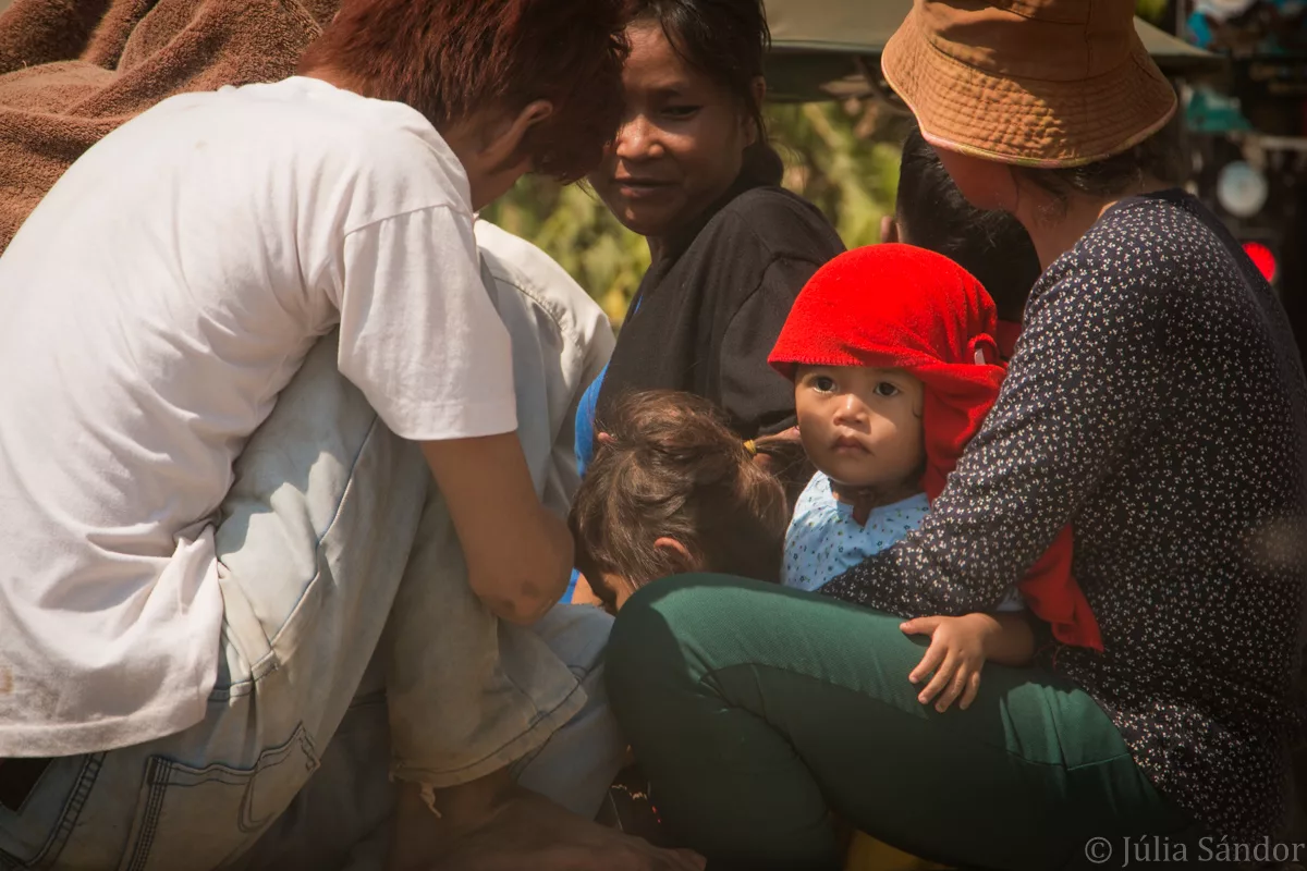 on-the-road-combodian-babysiem-reap-cambodia-faces-of-Asia-juliasanphotography Faces of Asia: Little boy surrounded by his family on the back of a truck
